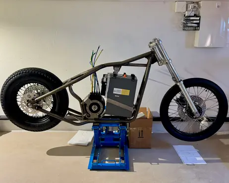 The rolling chassis standing on the garage floor