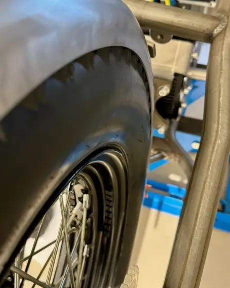 A fender held over the rear tire to judge the line