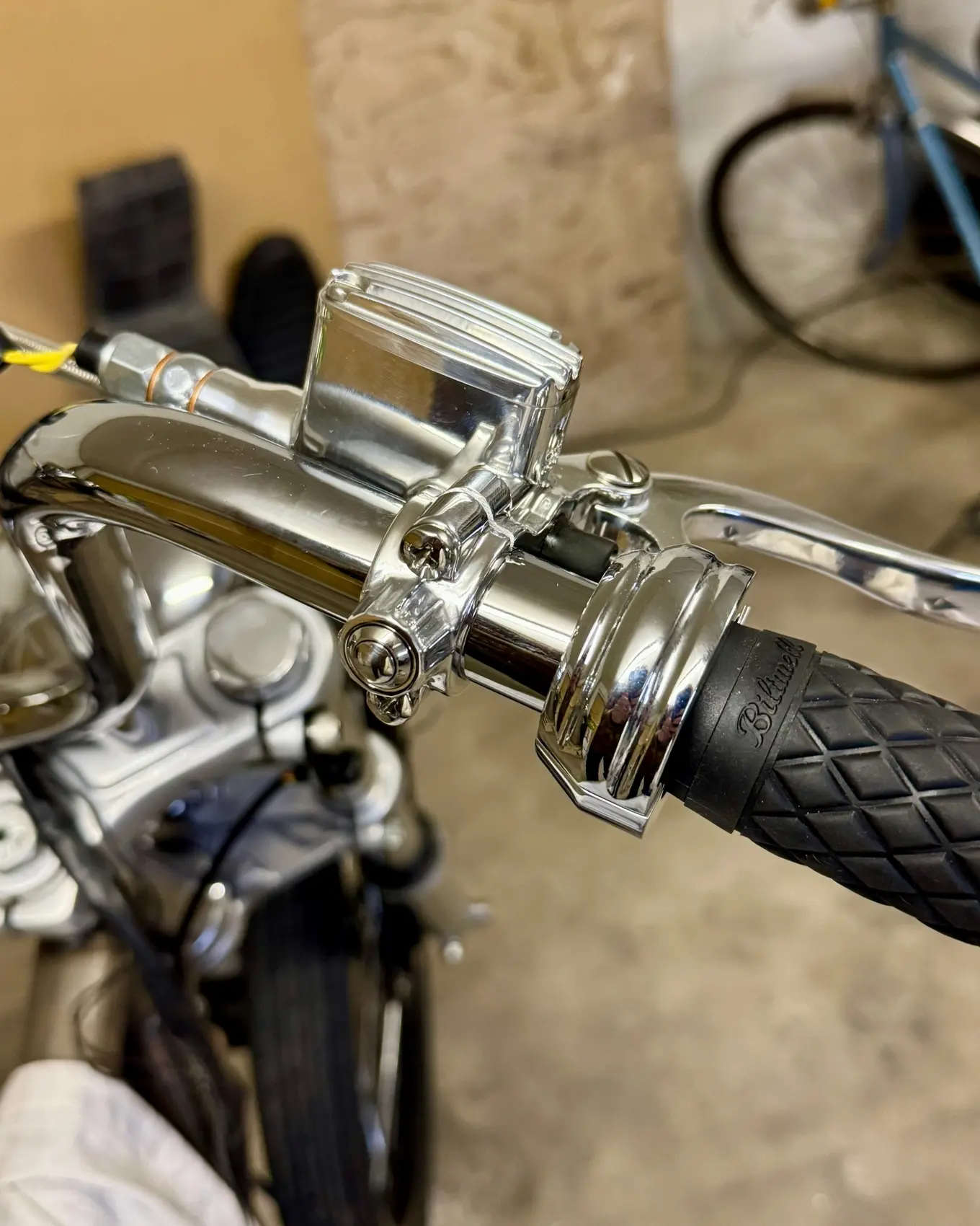The grip and brake lever on the handlebar