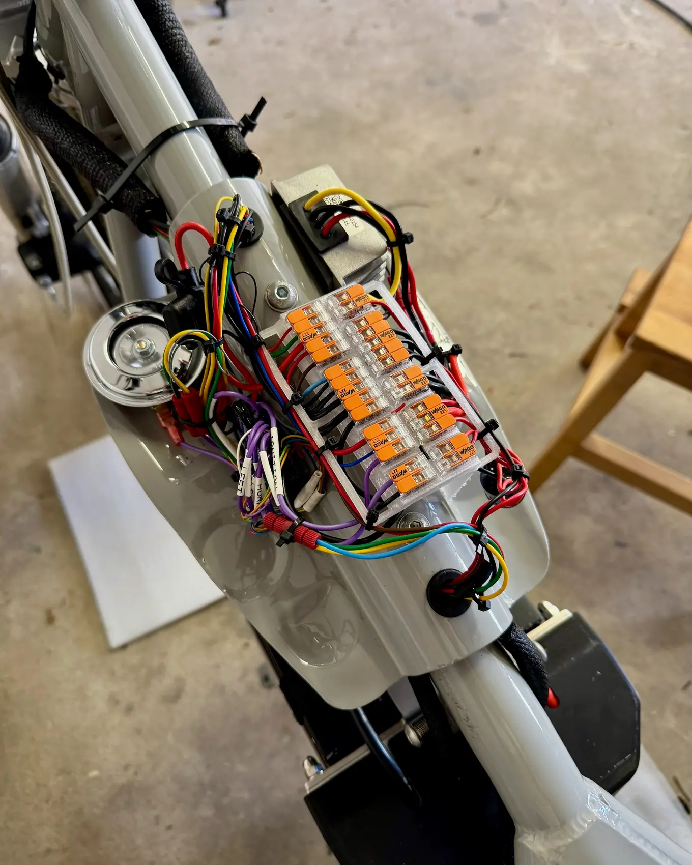 The same loom from further back, wires fanned out to each side